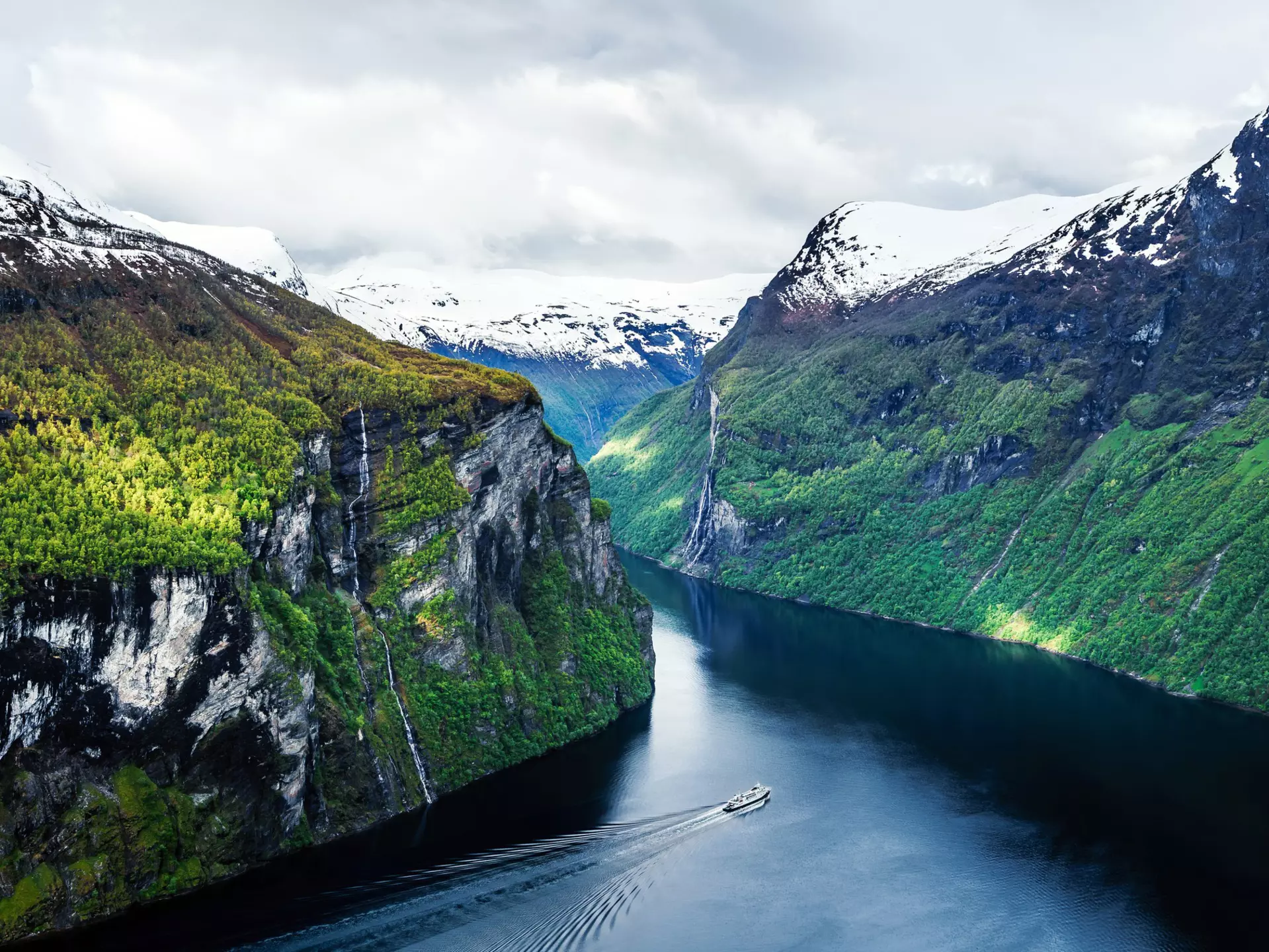 Take in the spectacular scenery on a ferry through Geirangerfjord © Marco Wong / Getty Images