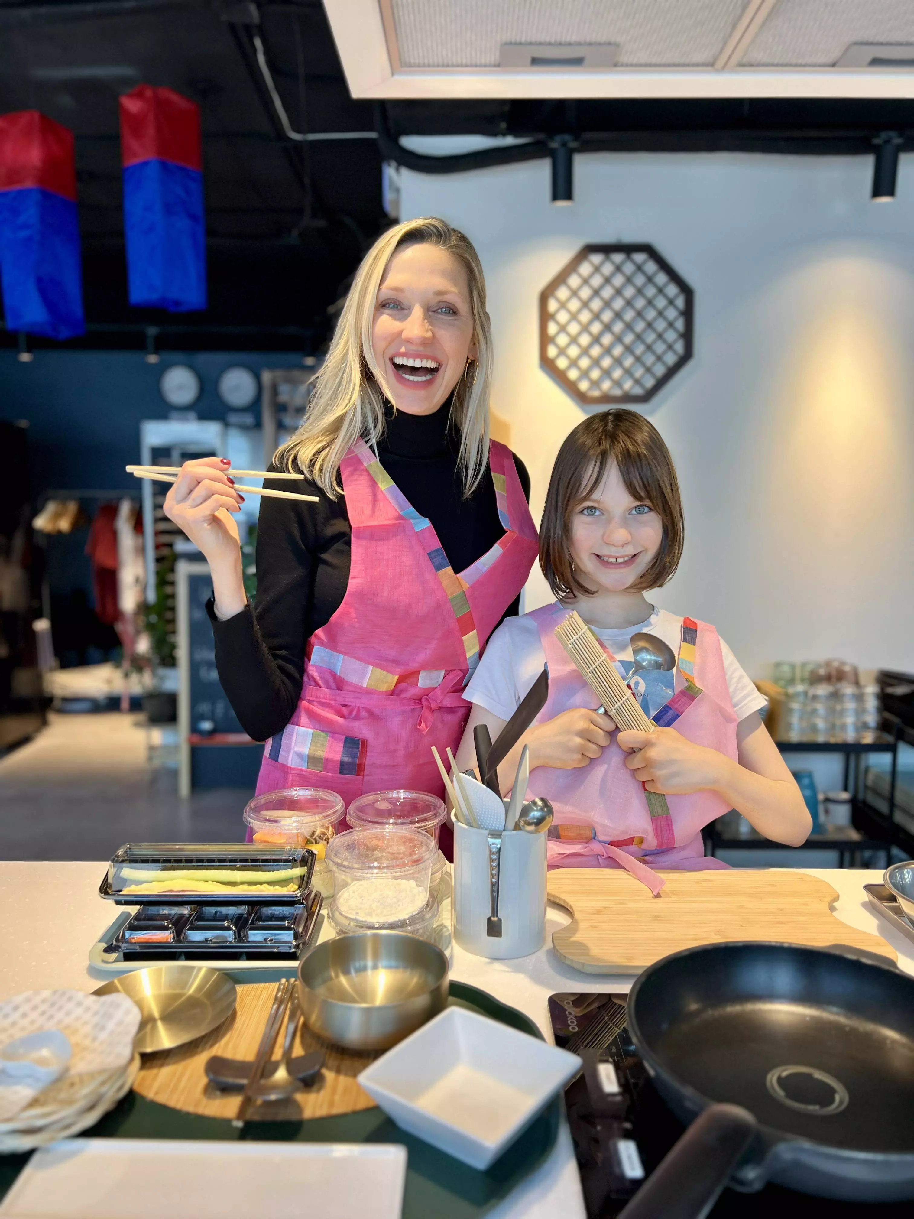 Catherine McCord and her daughter taking a Korean cooking class in Seoul