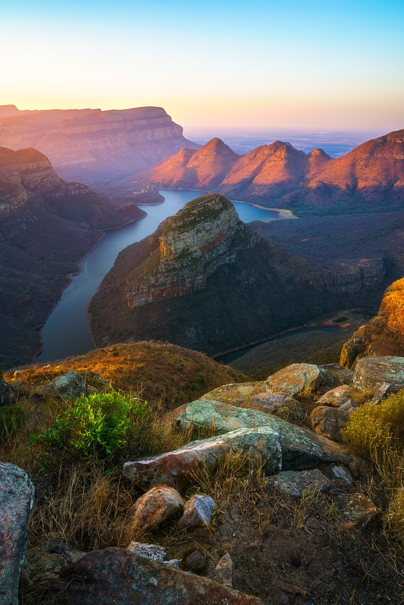 view of three rondavels and the blyde river canyon at sunset in south africa; Shutterstock ID 1536002621; your: Sloane Tucker; gl: 65050; netsuite: Online Editorial; full: POI