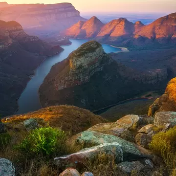 view of three rondavels and the blyde river canyon at sunset in south africa; Shutterstock ID 1536002621; your: Sloane Tucker; gl: 65050; netsuite: Online Editorial; full: POI