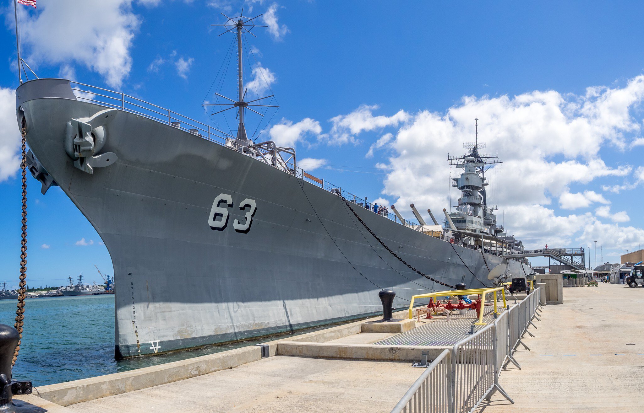 OAHU, HI - AUG 5, 2016: The USS Missouri battleship on August 5, 2016 in Pearl Harbor, USA. Site of the treaty signing ending WWII between the US and Japan, is now berthed in Pearl Harbor.; Shutterstock ID 471139421;