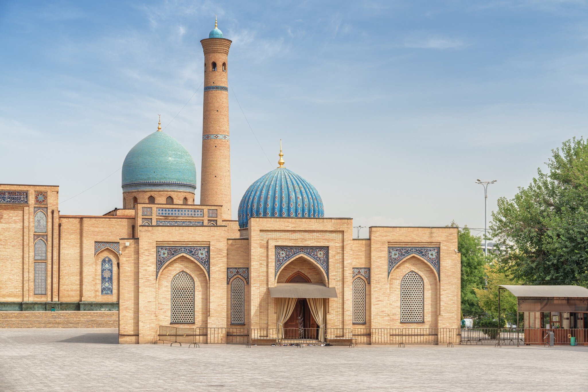 View of Hazrati Imam Mosque and Muyi Muborak Madrasah (Moyie Mubarek Library Museum) in Tashkent, Uzbekistan. The Hazrati Imam architectural complex is a popular tourist attraction of Central Asia.  License Type: media  Download Time: 2023-05-17T23:45:22.000Z  User: kparker52331  Is Editorial: No  purchase_order:   