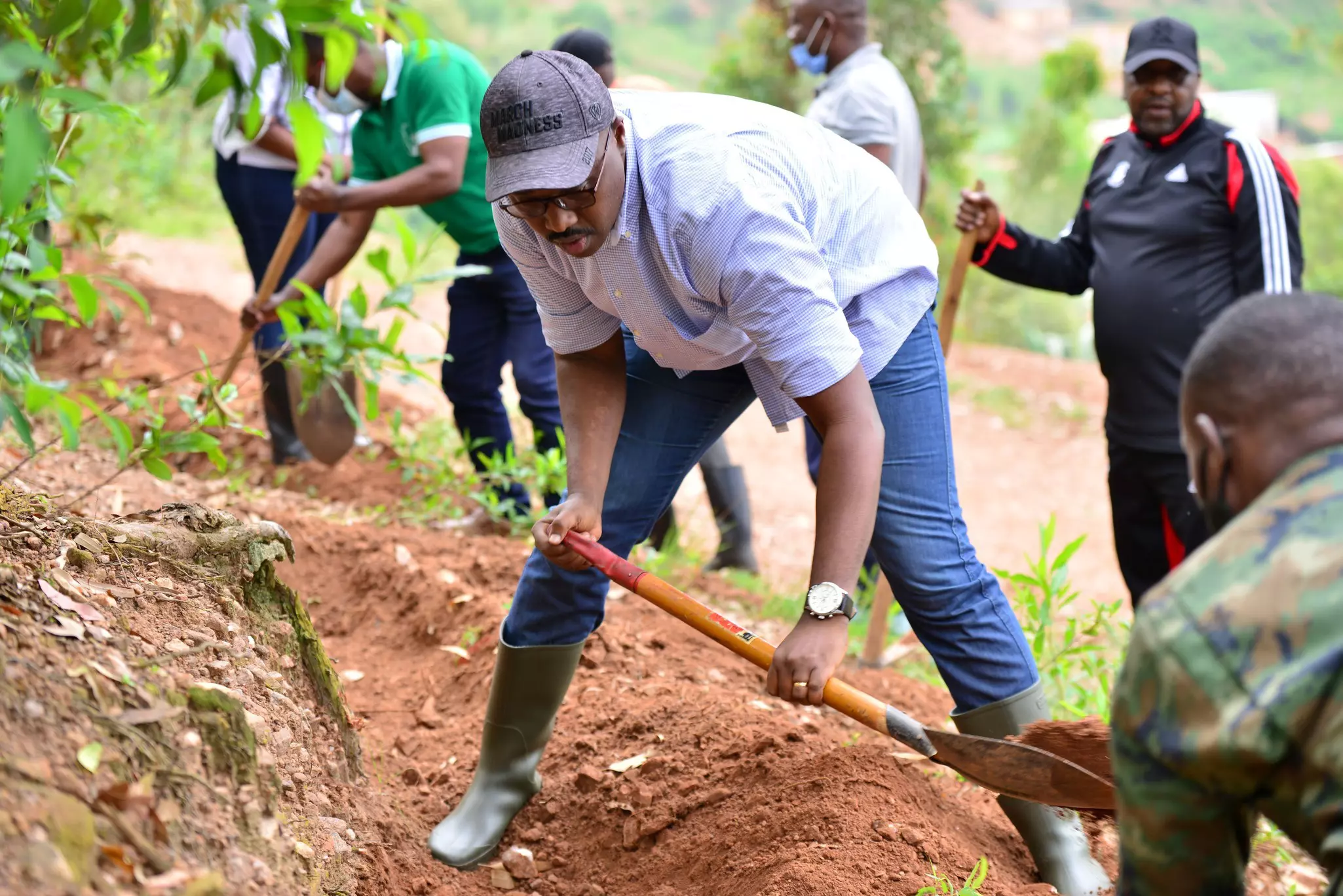 Pudence Rubingisa, mayor of Kigali, takes part in the national community work known as Umuganda © Cyril Ndegeya / Getty Images