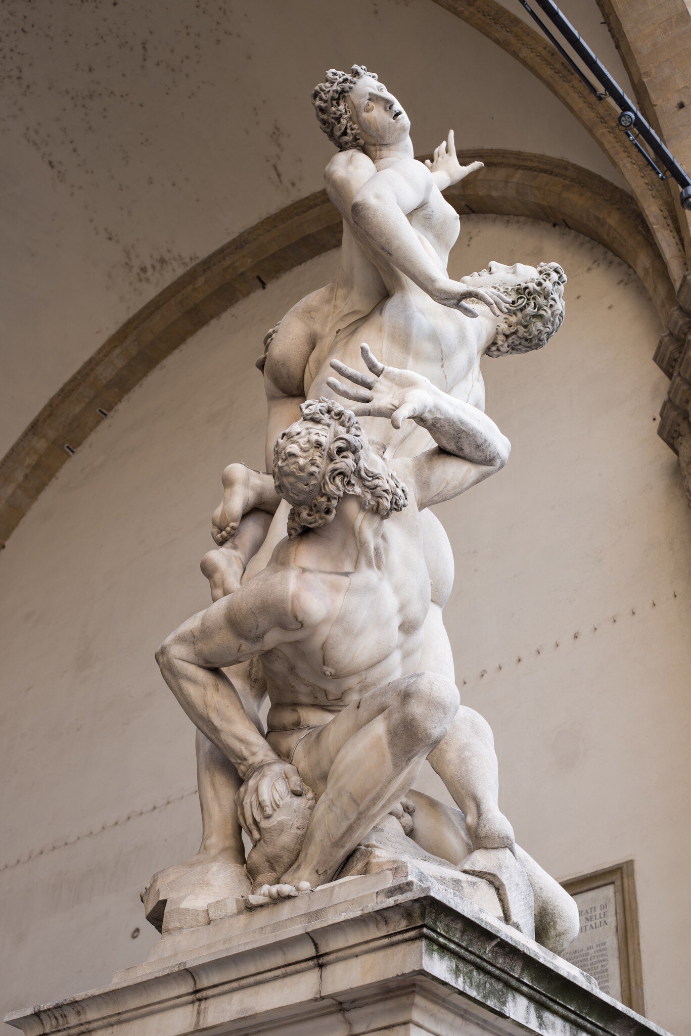 'The Rape of the Sabine Women' sculpture by Giambologna, in the Loggia dei Lanzi in Florence, Italy.