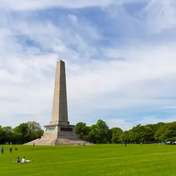 DUBLIN, IRELAND - MAY 17, 2014: The Wellington Monument is an obelisk located in the Phoenix Park. The monument is 62 metres (203 ft) tall and it is the largest obelisk in Europe.
