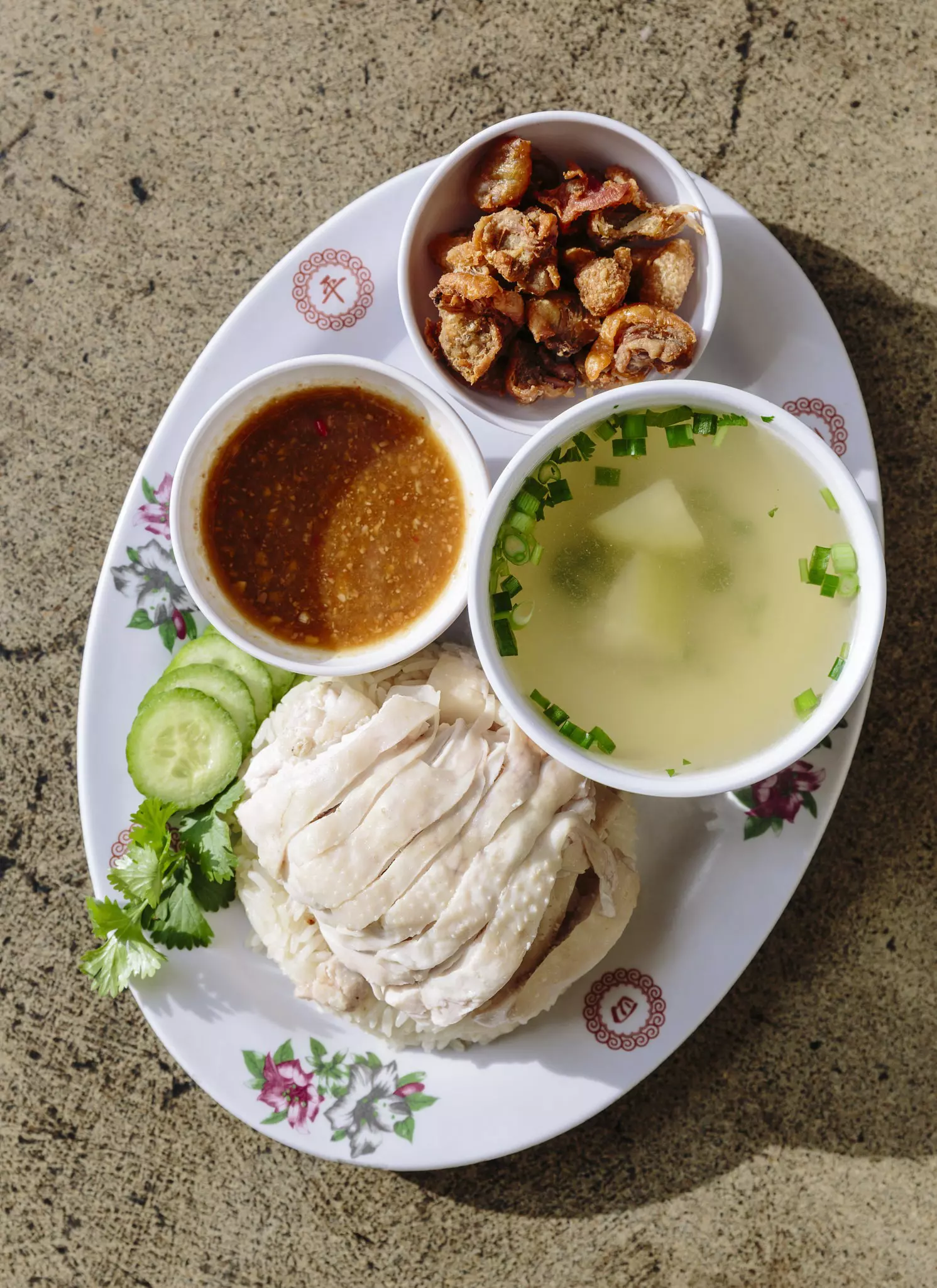 A plate of food from Nong’s Khao Man Gai food cart in Portland.