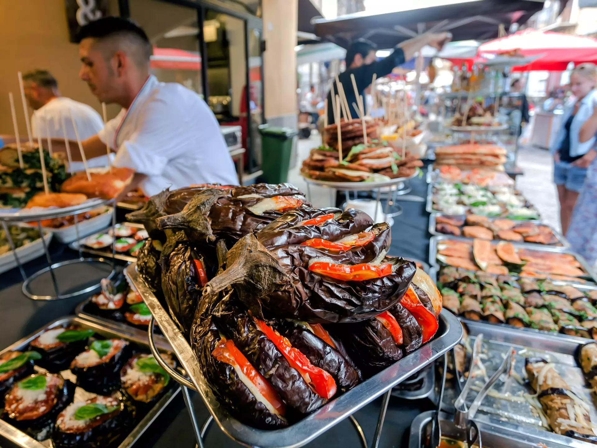 Stuffed eggplant and other choices at a Palermo street stall. Radiokafka/Shutterstock