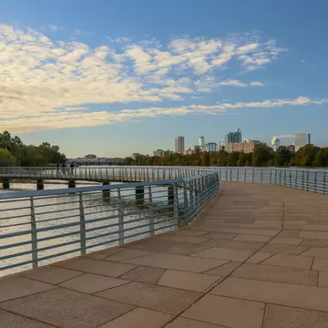 Lady Bird Lake Boardwalk, walking path along the Colorado River in Austin  Texas skyline.; Shutterstock ID 1221197338;
