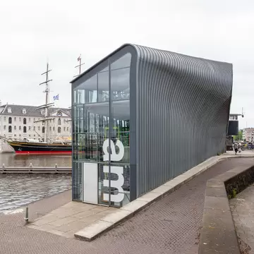 Exterior view of the Arcam building by the waterfront in Amsterdam, Netherlands.