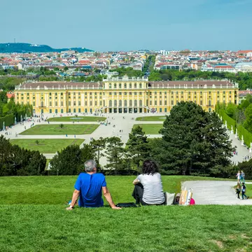 Visitors relaxing in the gardens of Schönbrunn Palace. Nick Starichenko/Shutterstock