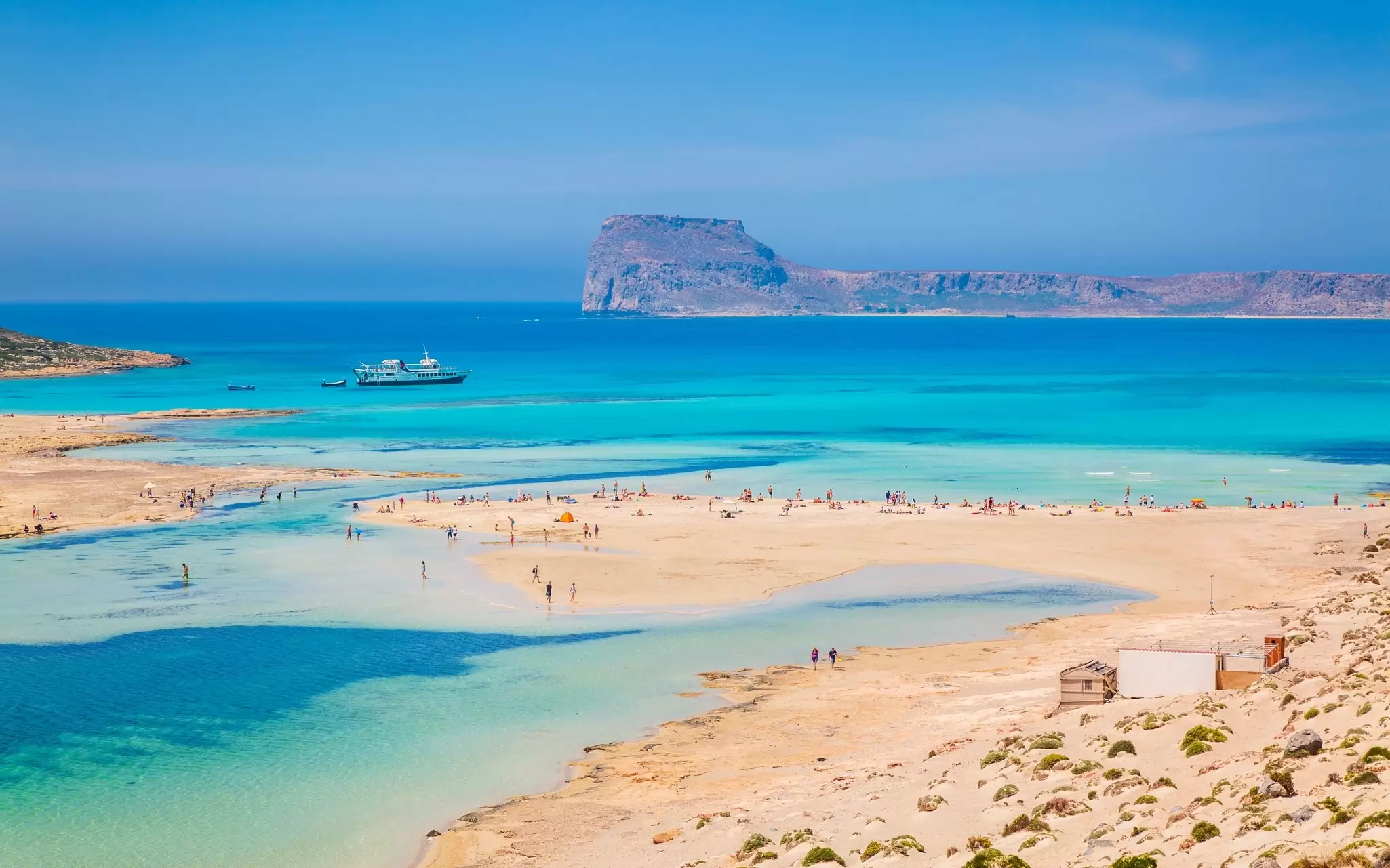 Visit Balos beach near Gramvousa Peninsula. Robert Harding Video/Shutterstock