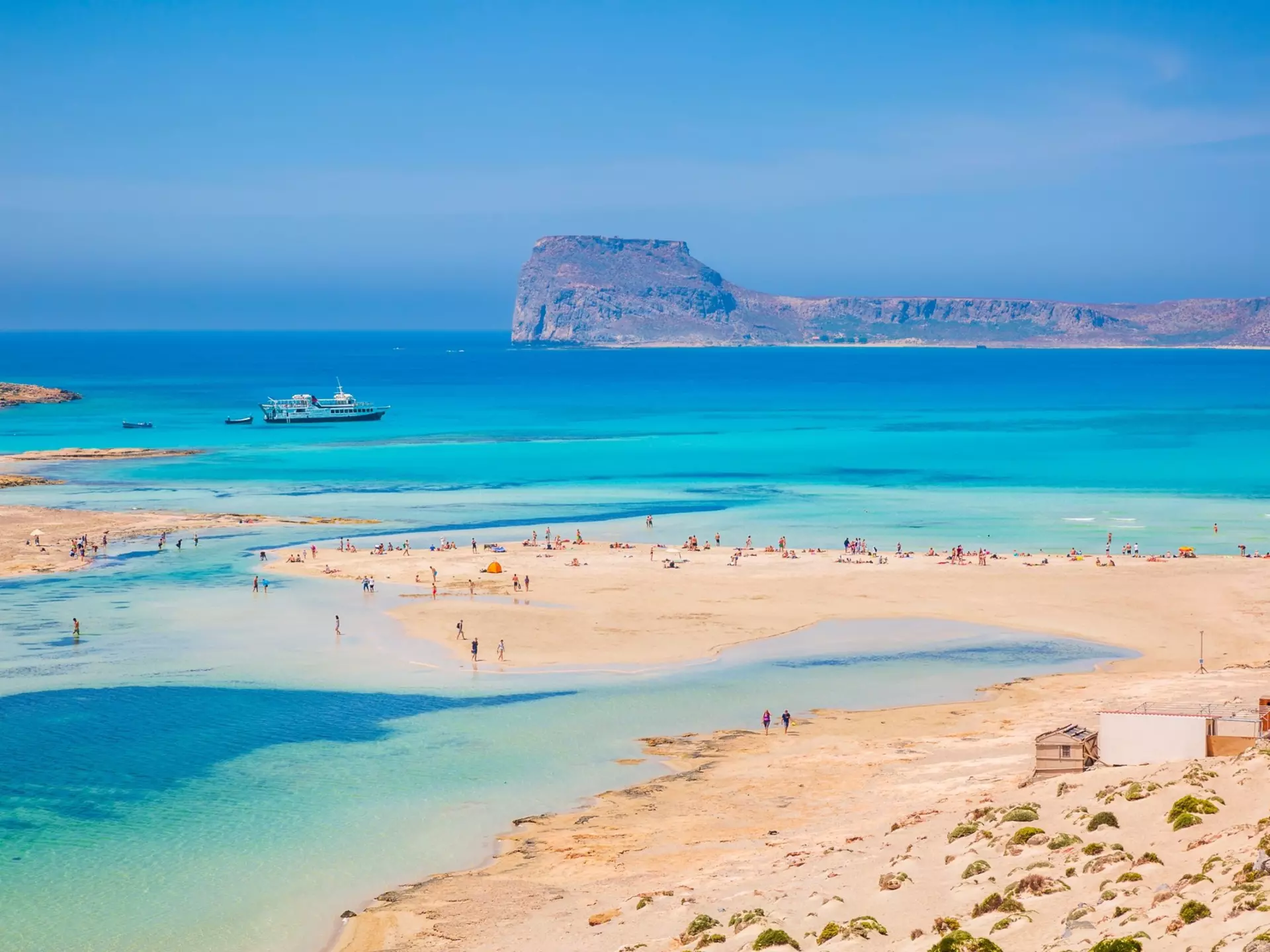 Visit Balos beach near Gramvousa Peninsula. Robert Harding Video/Shutterstock