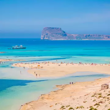 Visit Balos beach near Gramvousa Peninsula. Robert Harding Video/Shutterstock