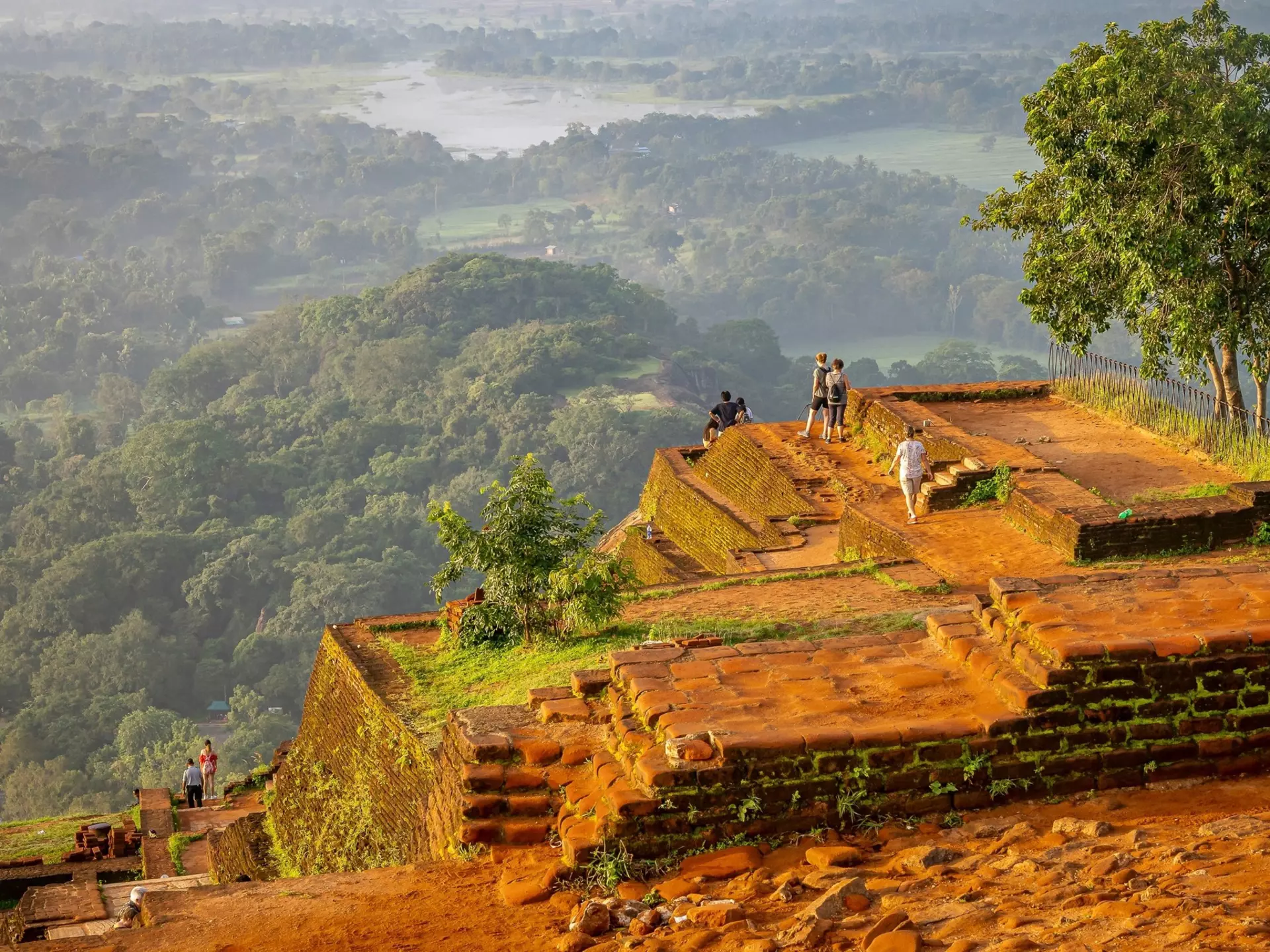 Visitors at top of the rock fortress of Sigiriya, Sri Lanka. Wesche/Shutterstock