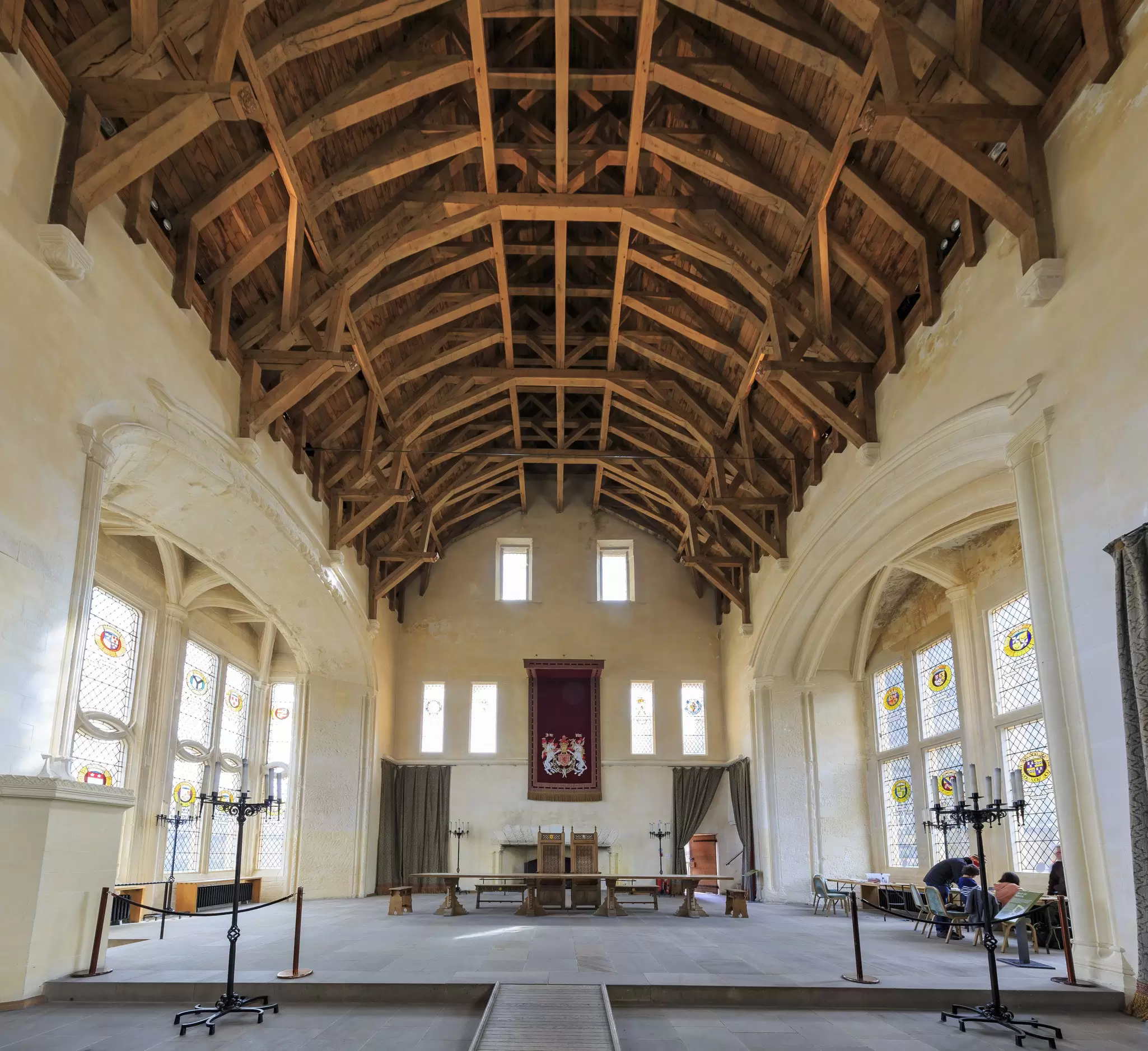 A huge meeting hall with an arched timbered ceiling