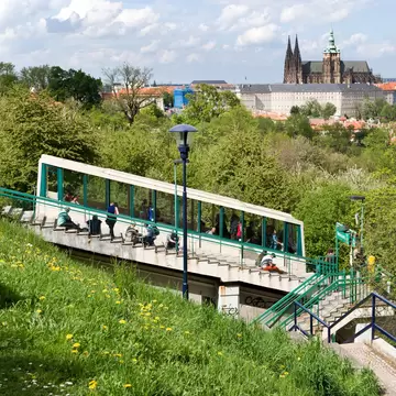 Prague castle with st. Vitus cathedral, Petrin hill funicular tram, Lesser Town, Prague (UNESCO), Czech republic. Nebozizek train station.