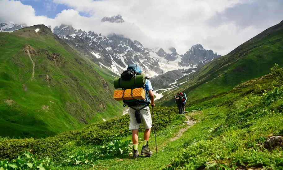 Hiking from Svaneti in summertime. Maya Karkalicheva / Getty Images