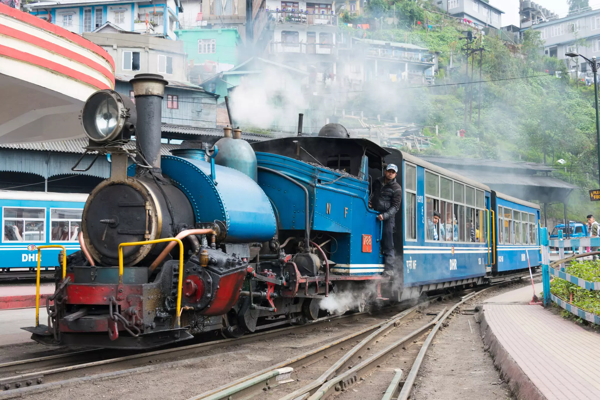 A steam train on the Darjeeling Himalayan Railway pulls into Darjeeling, India.