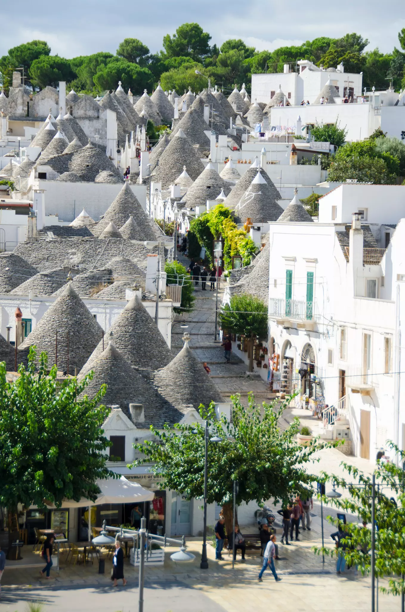 People strolling around Alberobello, the cultural capital of Valle d'Itria