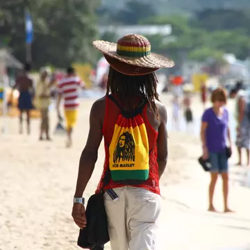 Take a stroll on the famous seven mile beach which is central to all beach life in Negril, Jamaica