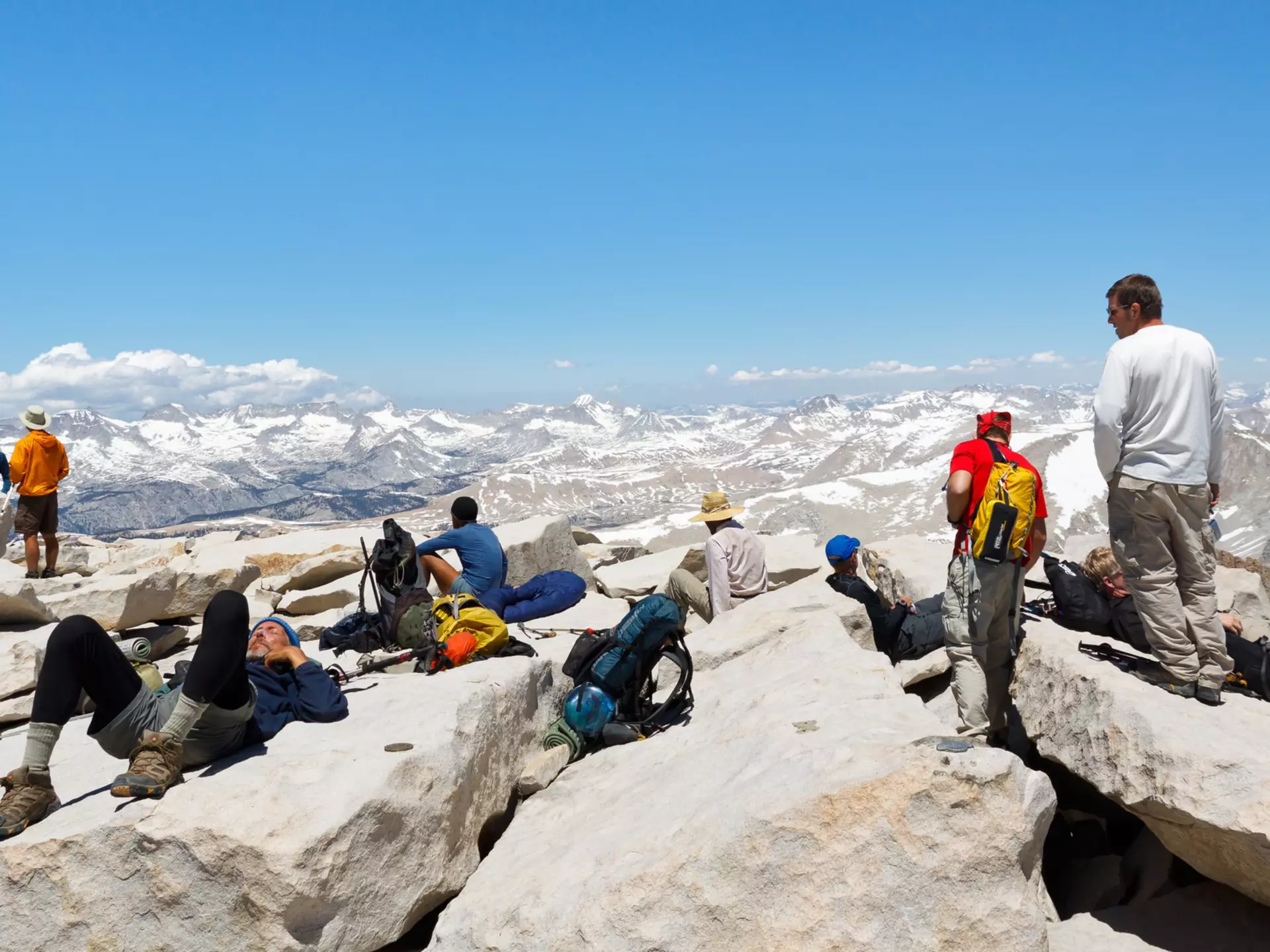 MOUNT WHITNEY, CA - JUNE 30: Hikers rest after a strenuous climb on June 30, 2010, on the summit of Mount Whitney. In 2009 ca. 25,000 people summited the highest peak in the continental United States., License Type: media, Download Time: 2025-08-04T20:29:27.000Z, User: meg3348277, Editorial: true, purchase_order: 56530 - Guidebooks, job: Global Publishing-WIP, client: Lonely Planet 'California 11, other: Megan Cassidy