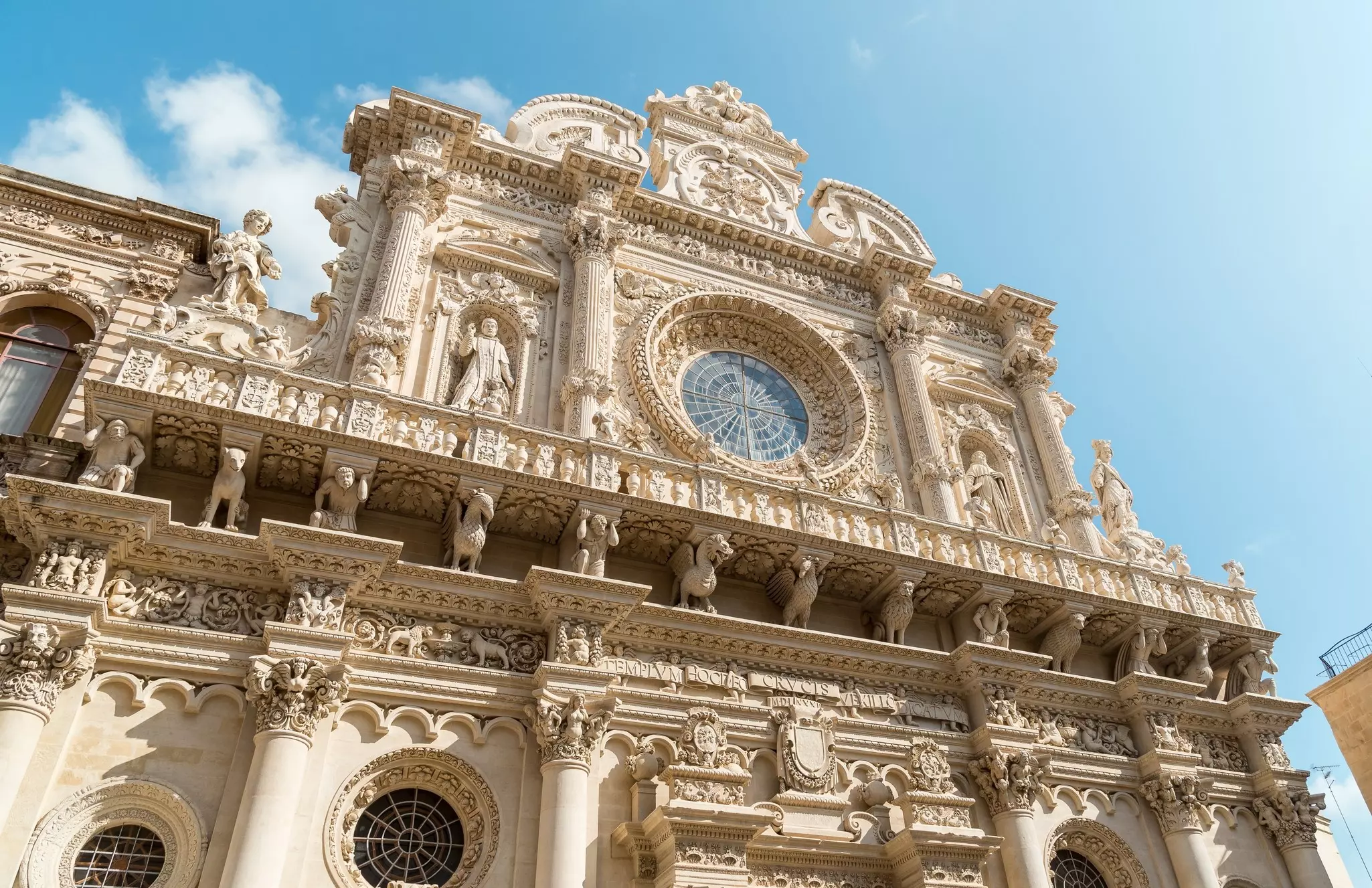 View of the Basilica di Santa Croce church in the historic center of Lecce, Puglia, Italy.