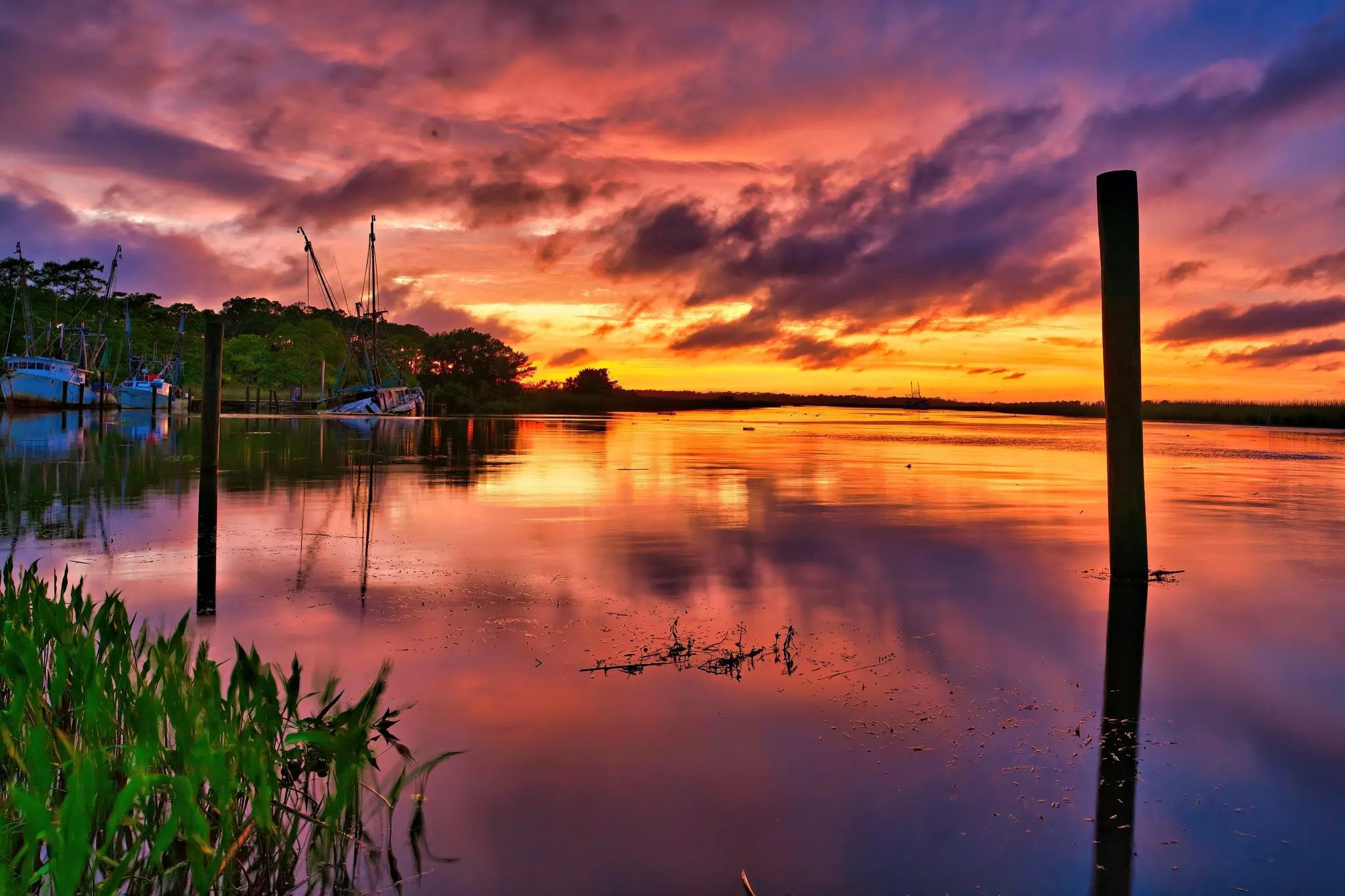 Colorful sunset sky reflected on Apalachicola Bay