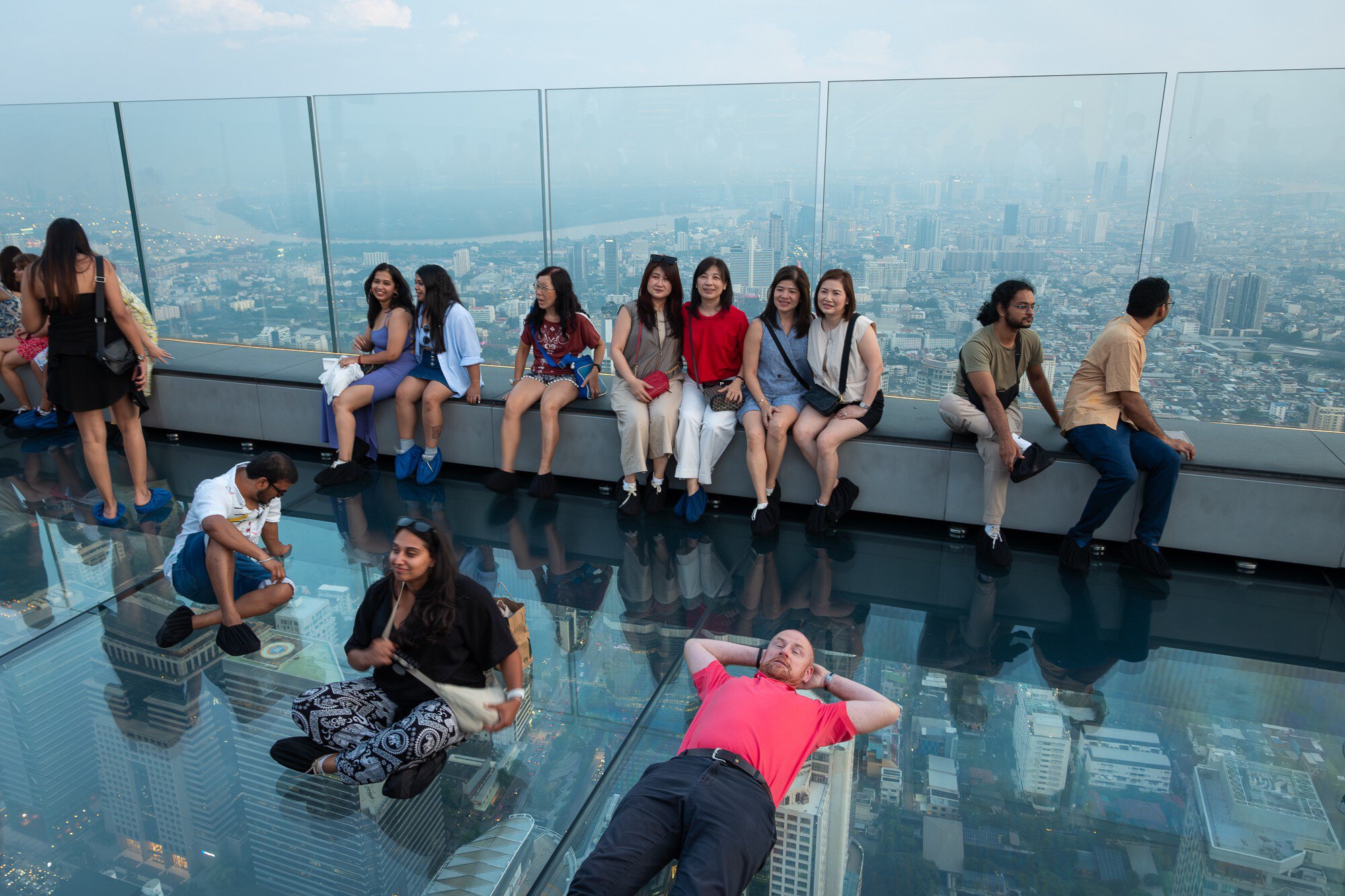 People posing for photos on the Skywalk