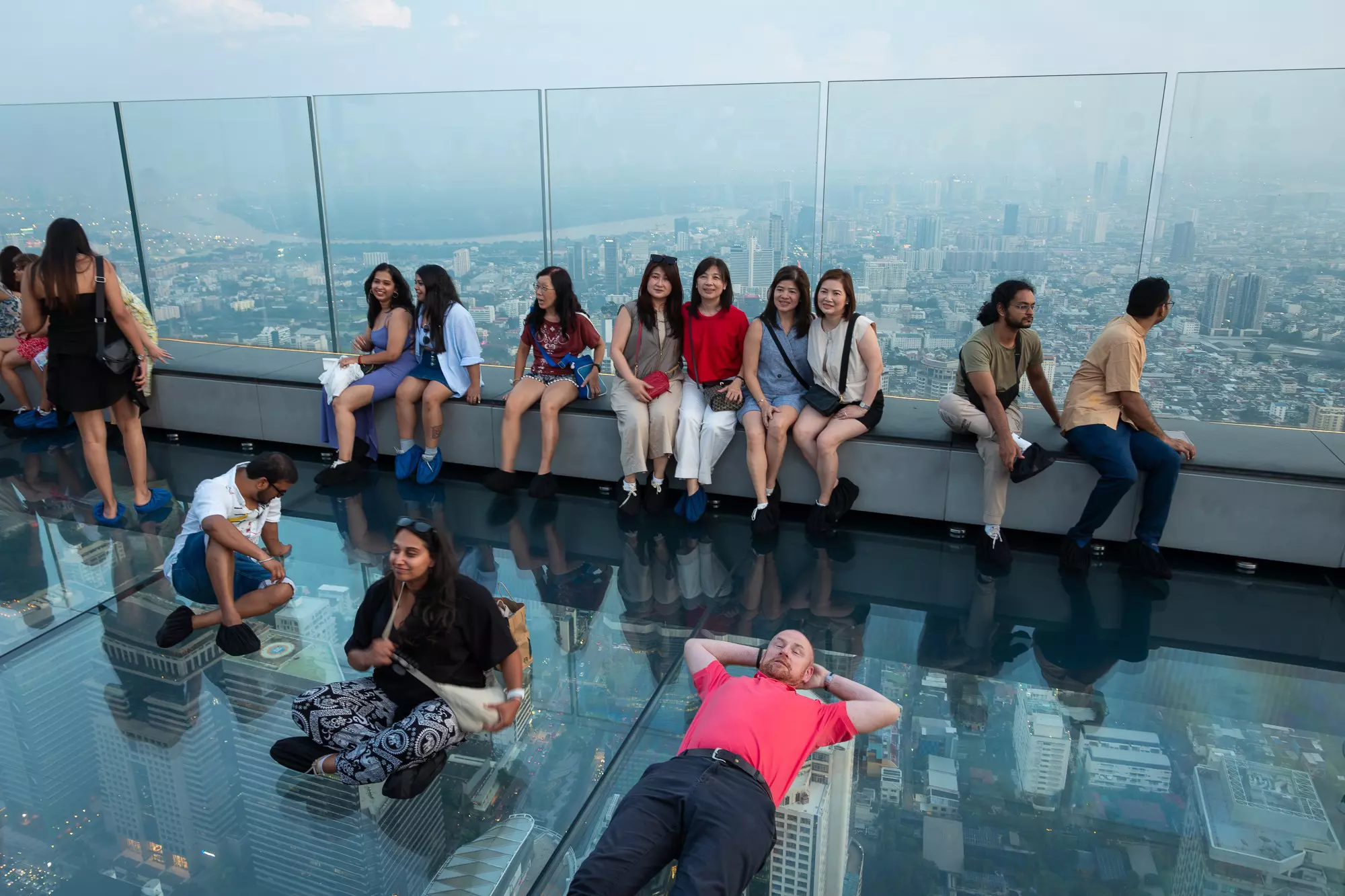 People posing for photos on the Skywalk