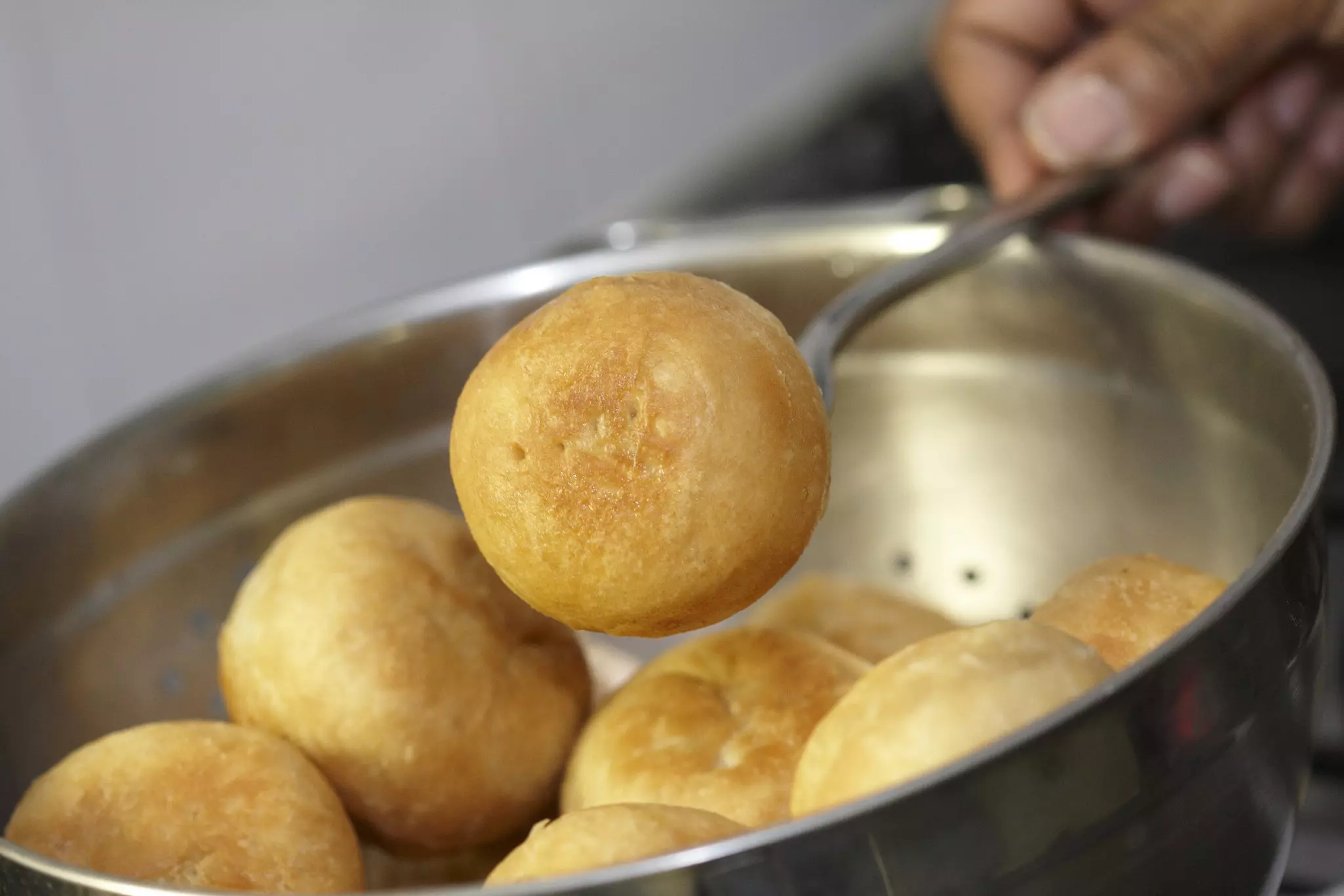 West Indian Johnny Cakes Being prepared And Cokked