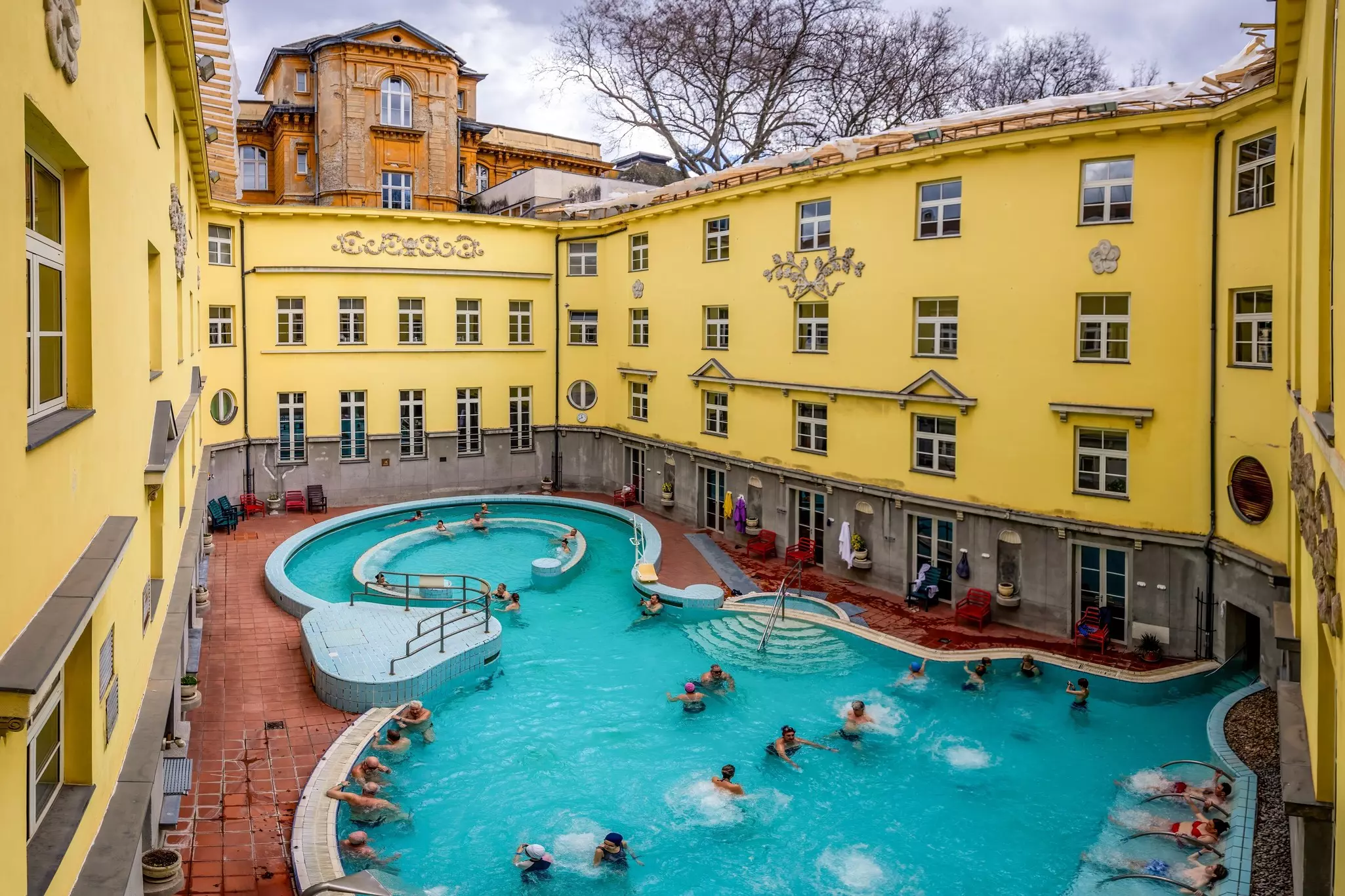 Budapest, Hungary - March 24, 2024: Lukács Thermal Bath in Budapest, Hungary. Historic Hungarian thermal baths in Europe. People enjoying thermal baths in Budapest., License Type: media, Download Time: 2025-07-24T11:25:05.000Z, User: clairenaylor, Editorial: true, purchase_order: 65050 - Digital Destinations and Articles, job: Online editorial, client: Budapest thermal baths , other: Claire Naylor