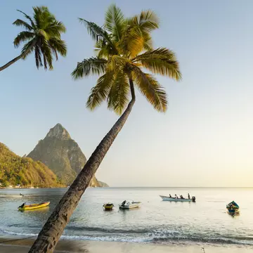 A beach in St Lucia with Gros Piton in the distance. Justin Foulkes for Lonely Planet