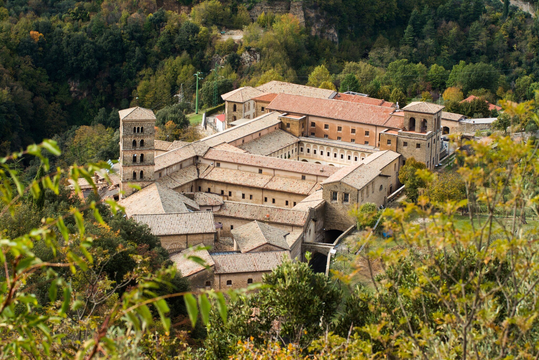 View of Saint Scholastica medieval monastery surrounded, by trees in Subiaco. Founded by Benedict of Nursia .; Shutterstock ID 1736371556;