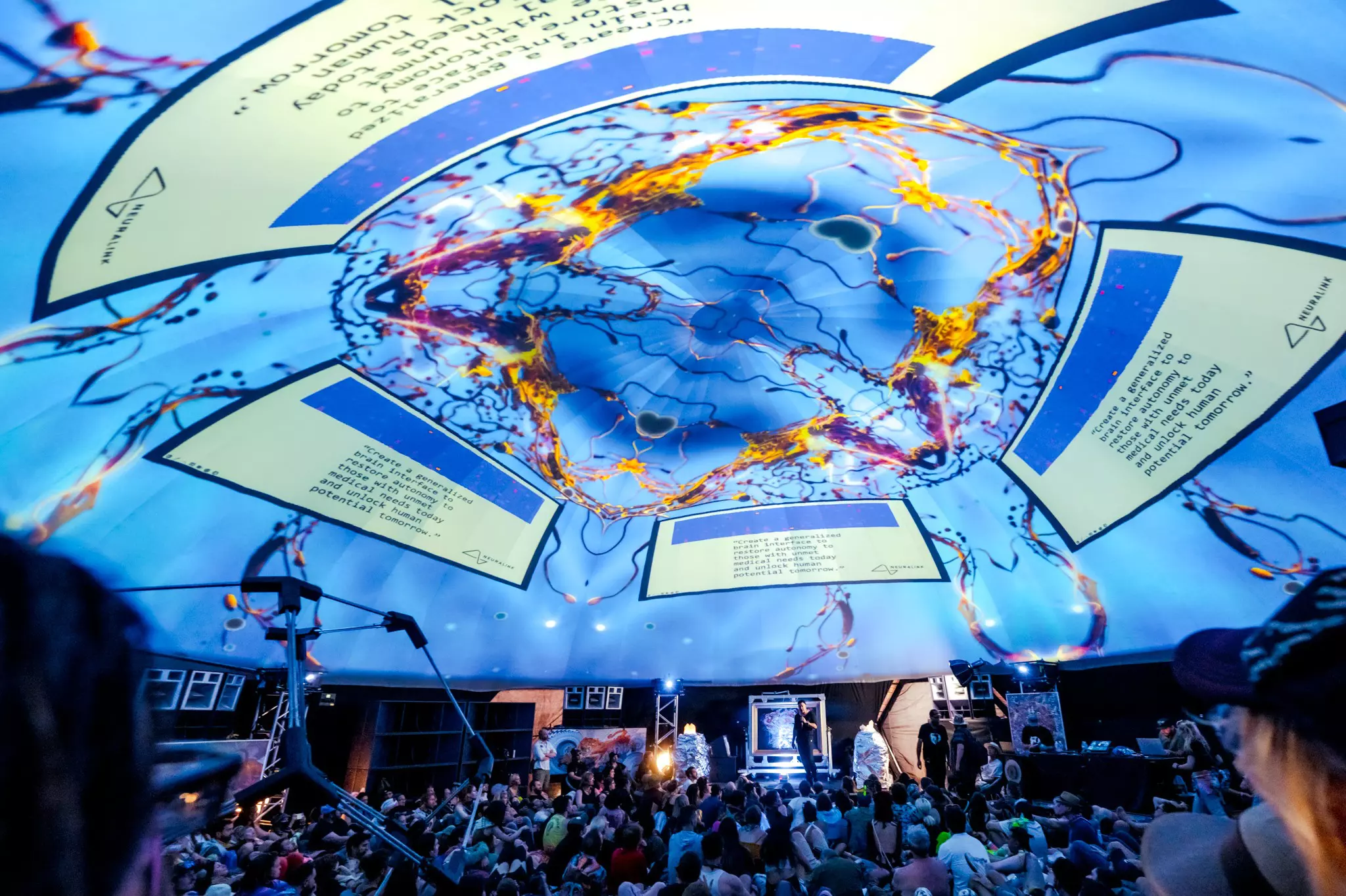 Inside a giant tent with projections on the roof at a Iceland music festival 2026