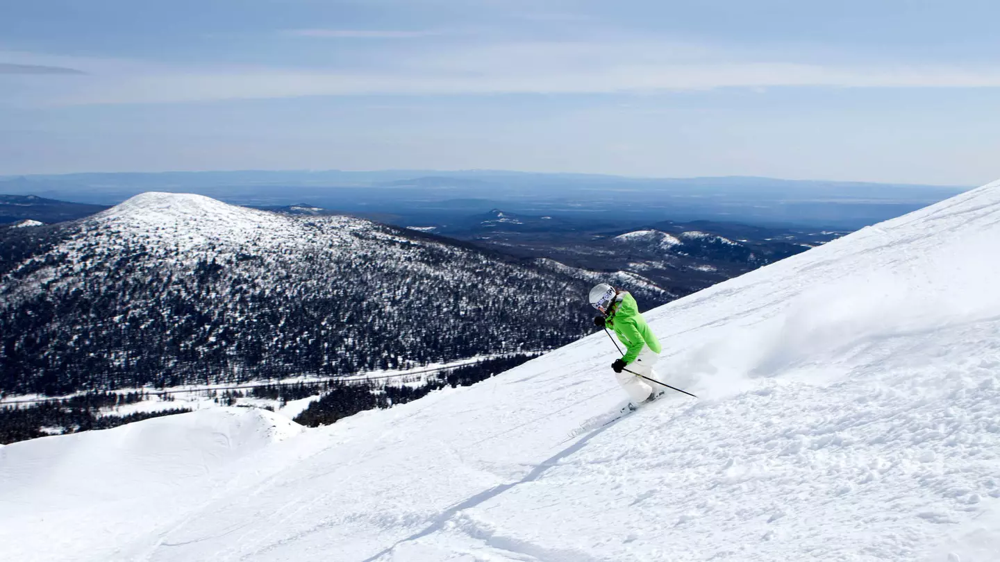 A woman skiing at Mt. Bachelor resort in Bend Oregon