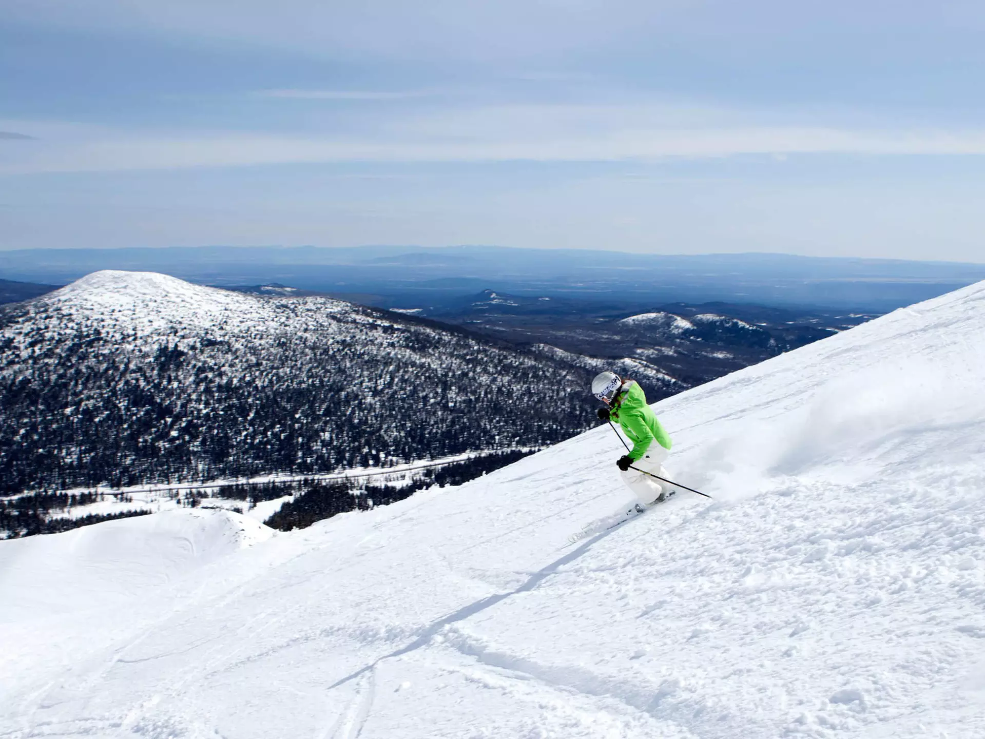 A woman skiing at Mt. Bachelor resort in Bend Oregon