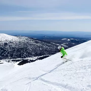 A woman skiing at Mt. Bachelor resort in Bend Oregon
