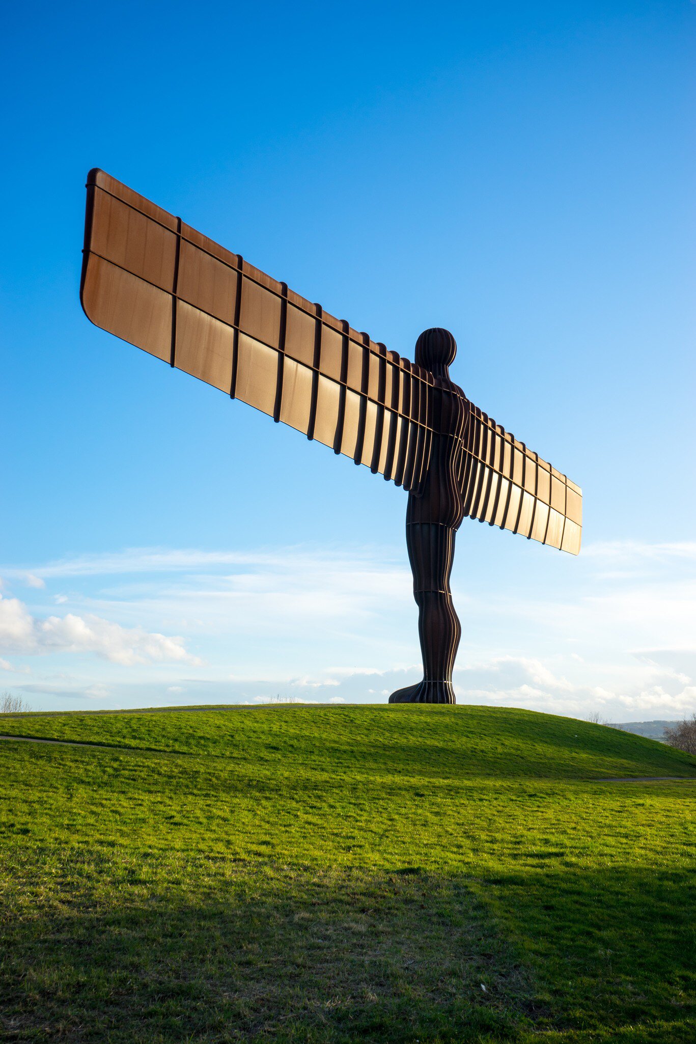 GATESHEAD, UK - MARCH 27, 2016. The Angel of the North, Gateshead. A steel sculpture by Antony Gormley, stands 66 feet high with a wing span of 177 feet. The sky is blue, the Angel isolated.
404670181
angel, antony, artwork, blue, crowd, england, figure, gateshead, gormley, heritage, icon, industrial, isolated, landmark, metal, modern, monument, newcastle, north, northumberland, sculpture, sky, steel, structure, summer, tall, tourist, tyne, uk, wear