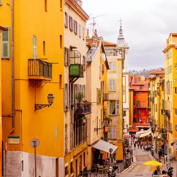 Explore the winding and narrow streets of Nice's Old Town with this walking guide to cafes, shops and sights © Getty Images
