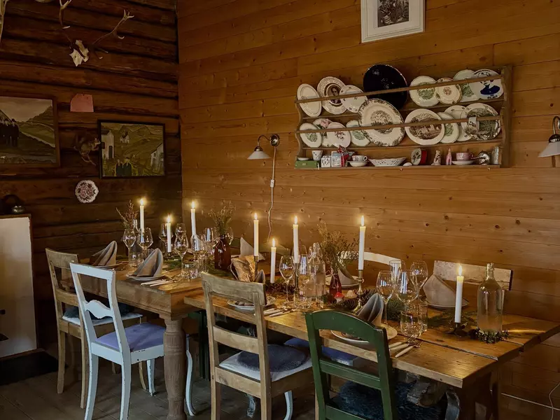 Dinner at Søstuen Kafé with candles and a rustic but elegant table setting