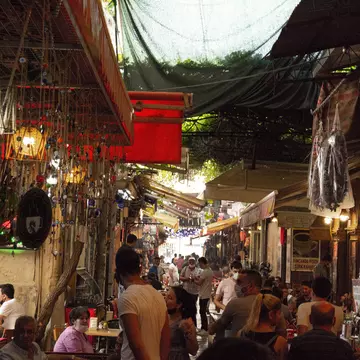 Ä°zmir KemeraltÄ± Bazaar Market, Turkey Middle East, Vintage Colors, Shopping Crowded People, Tight street, Day Light, Traditional Coffee Houses
İzmir Kemeraltı Bazaar Market, Turkey Middle East, Vintage Colors, Shopping Crowded People, Tight stre...