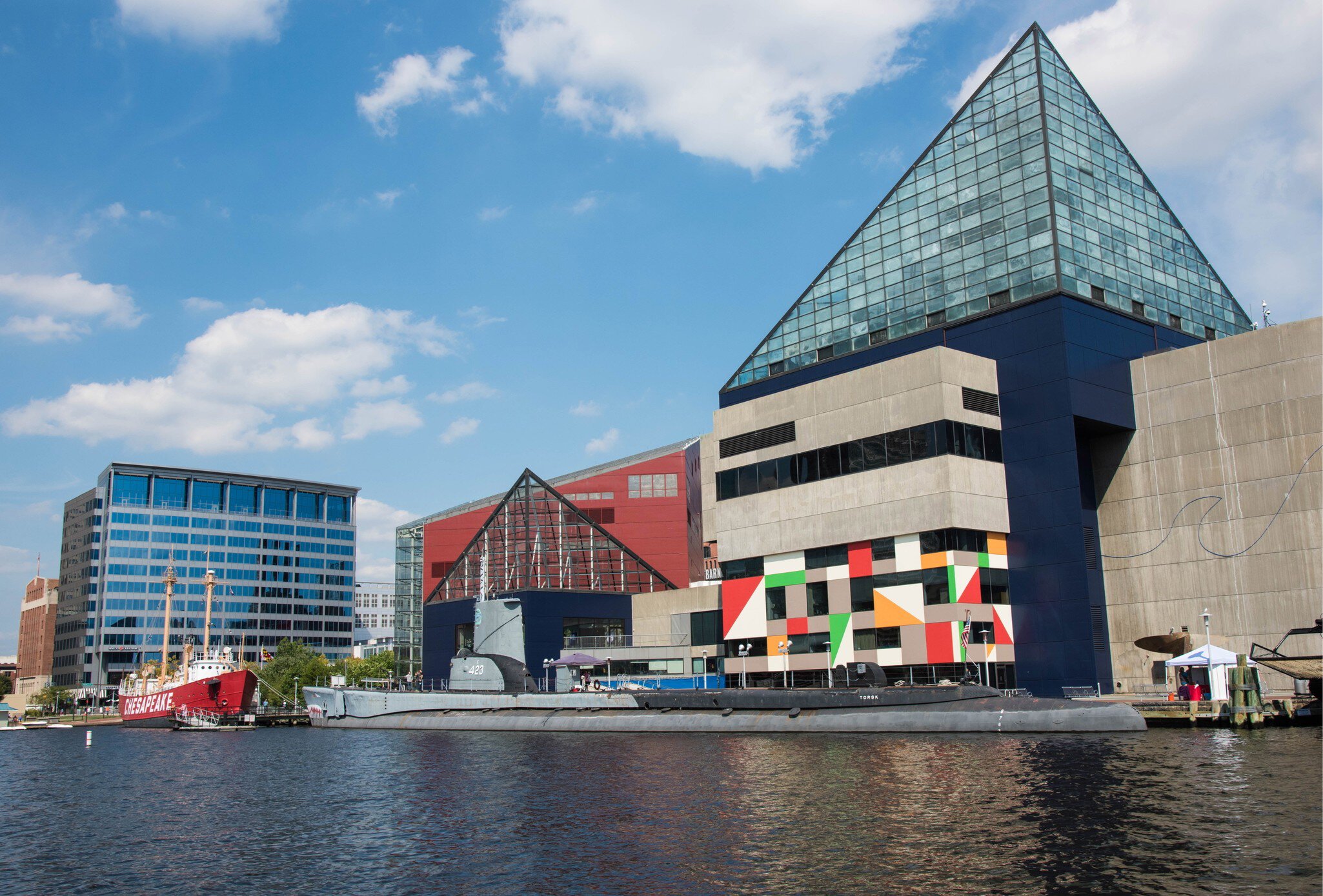 Historic ships in front of the National Aquarium, Baltimore, Maryland. (Photo By: Education Images/UIG via Getty Images)