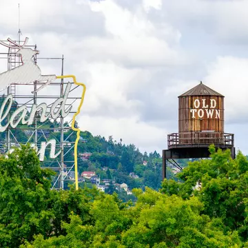 The White Stag sign can be seen when traveling into Old Town on the Burnside Bridge. PNG-Studio / Getty Images