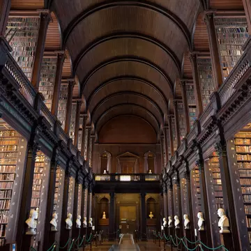 DUBLIN, IRELAND - FEB 15: The Long Room in the Trinity College Library on Feb 15, 2014 in Dublin, Ireland. Trinity College Library is the largest library in Ireland and home to The Book of Kells.
academic, ancient, architecture, archives, bibliophile, book, collection, college, complexity, concentration, culture, dublin, education, educational, encyclopedia, europe, famous, hall, historic, history, indoors, inside, institute, intelligence, ireland, irish, kells, ladder, landmark, learning, library, literature, long, memories, monument, old, research, room, school, science, shelf, student, tourism, travel, trinity, university, vintage, wood
