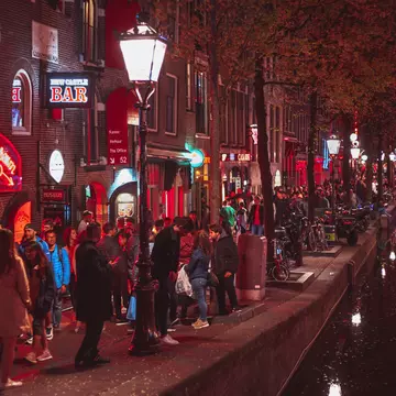 The Red Light District in Amsterdam is awash with blazes of neon and almost endless vice. Shutterstock