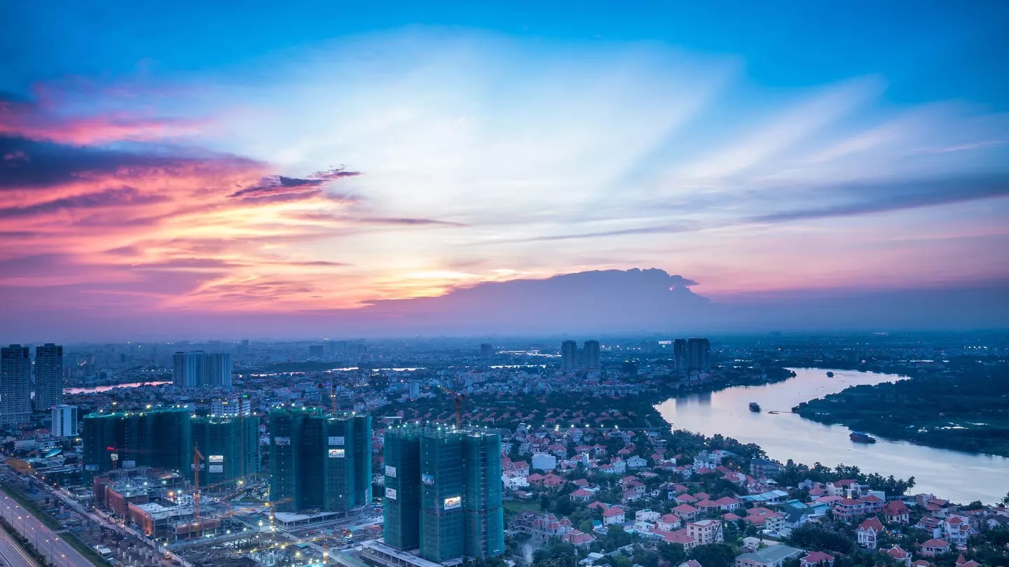 500px Photo ID: 114183909 - The buildings and whole area ahead is belong to District 2, and Thanh Da Island of Binh Thanh District of Ho Chi Minh City. A weekend day in the summer almost have been gone.