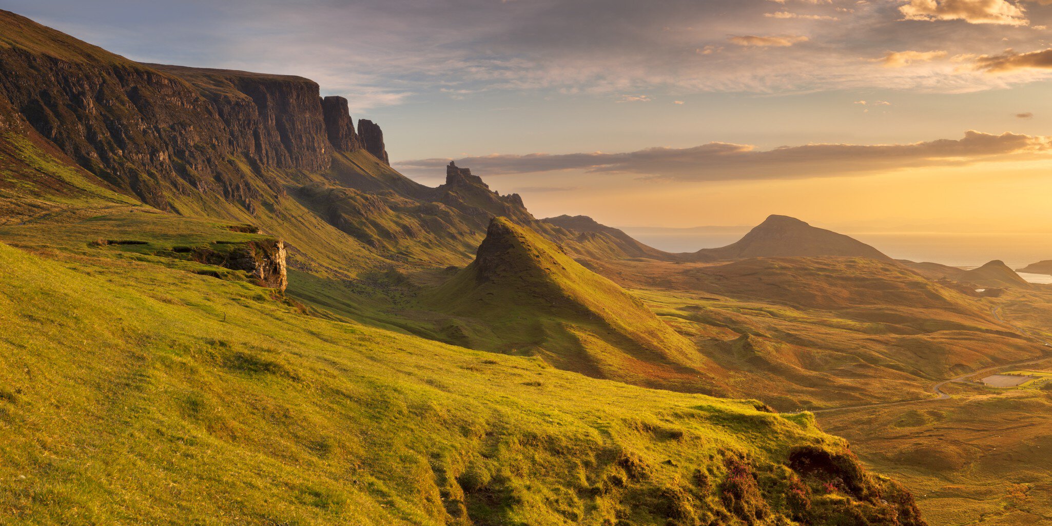 Beautiful light at Quiraing, Isle of Skye, Scotland. A seamlessly stitched panoramic image.
2015; Bright; Color Image; Color Intensity; Extreme Terrain; Famous Place; Hebrides; High Angle View; High Contrast; Highlands Region; Horizontal; Image; Inner Hebrides; Isle of Skye; Landscape; Mountain; Mountain Range; Nature; No People; Non-Urban Scene; Outdoors; Panoramic; Photography; Quiraing Needle; Rock - Object; Saturated Color; Scotland; Sunlight; Sunrise - Dawn; Travel Destinations; Trotternish; UK;
