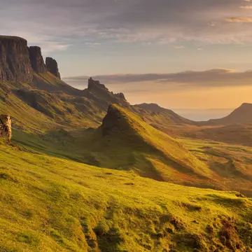 Beautiful light at Quiraing, Isle of Skye, Scotland. A seamlessly stitched panoramic image.
2015; Bright; Color Image; Color Intensity; Extreme Terrain; Famous Place; Hebrides; High Angle View; High Contrast; Highlands Region; Horizontal; Image; Inner Hebrides; Isle of Skye; Landscape; Mountain; Mountain Range; Nature; No People; Non-Urban Scene; Outdoors; Panoramic; Photography; Quiraing Needle; Rock - Object; Saturated Color; Scotland; Sunlight; Sunrise - Dawn; Travel Destinations; Trotternish; UK;