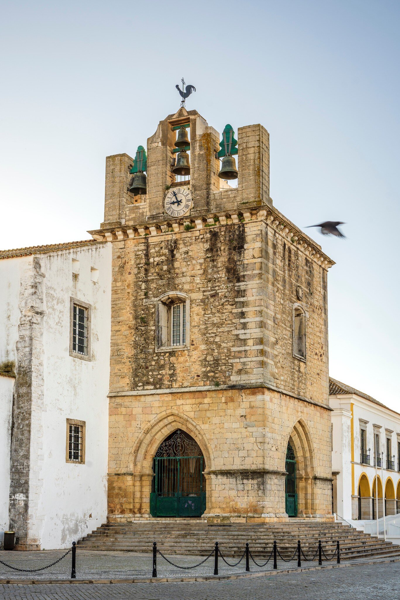 View of Faro’s cathedral, the Sé, in the morning light in Portugal.