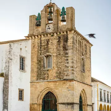 View of Faro’s cathedral, the Sé, in the morning light in Portugal.
